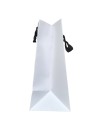 White paper bag with black ribbon handles