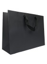 Black paper bag with black ribbon handles