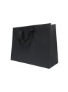Black paper bag with black ribbon handles