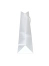 Bolsa de papel blanca con asas de cordón blanco