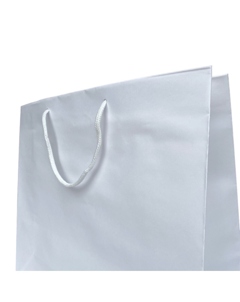Weiße Papiertüte mit weißen Kordelgriffen
