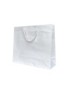 Bolsa de papel blanca con asas de cordón blanco