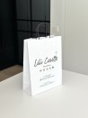Sac kraft Blanc M – Avec Poignées Noires Et Logo Bien En Vue